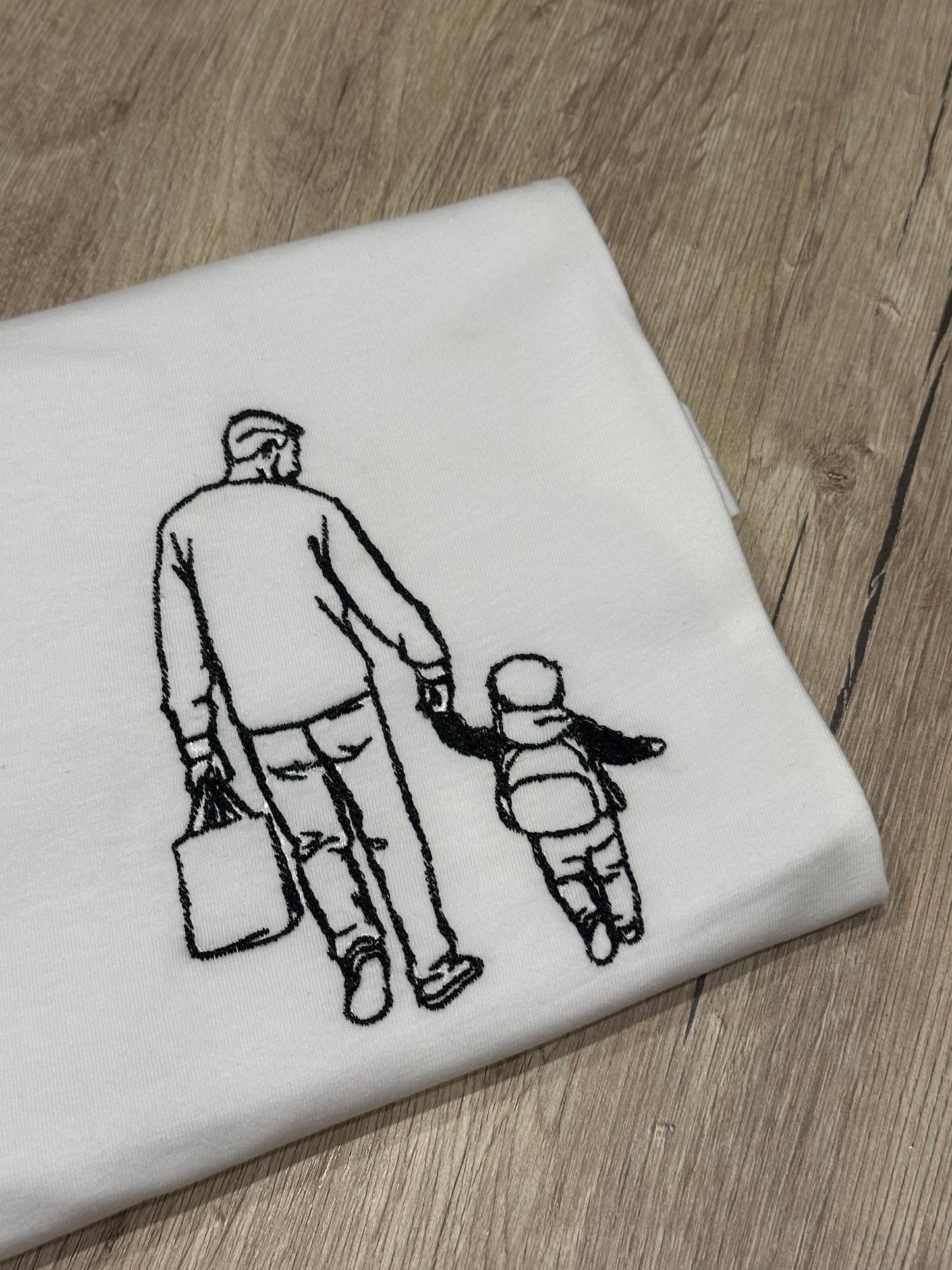 T-shirt con foto ricamata