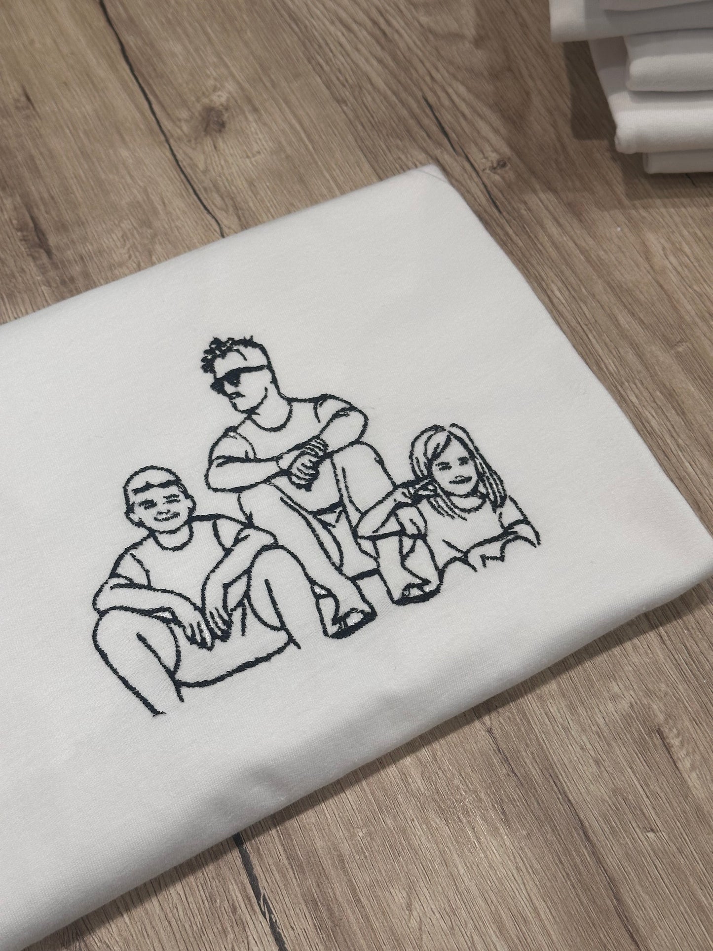 T-shirt con foto ricamata